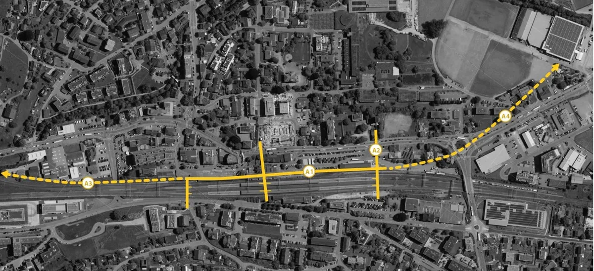 Man sieht einen Plan aus der Vogelperspektive, auf denen die Querungen am Bahnhof eingerzeichnet sind.